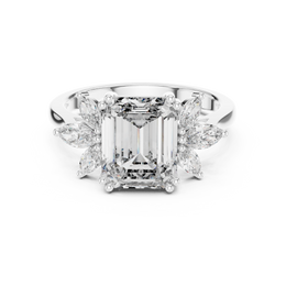 The Enchanté Emerald Ring with Side Stone