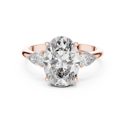 Oval Diamond Ring with Pear Side Stone